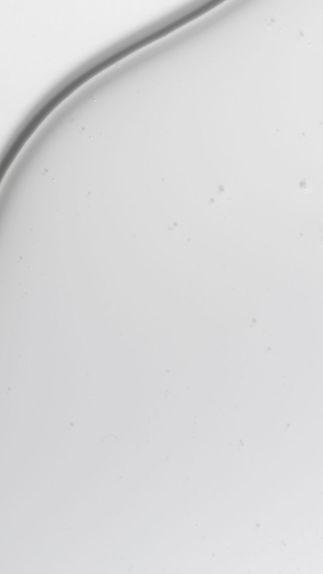 Dr Loretta Gentle Hydrating Cleanser application on skin showing gentle makeup removal