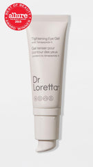 Dr. Loretta eye gel application under the eye for puffiness reduction.