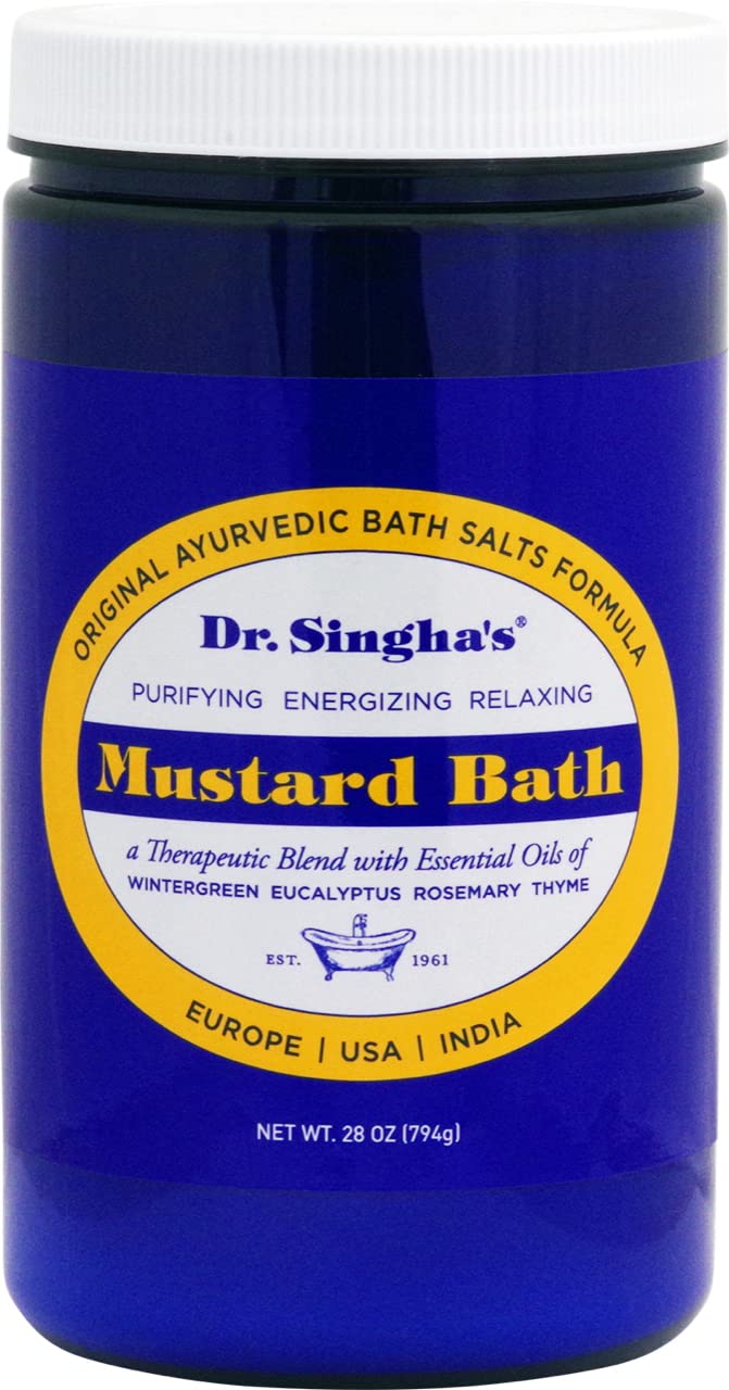 Dr. Singha's Mustard Bath bottle pour signals a calming evening soak.
