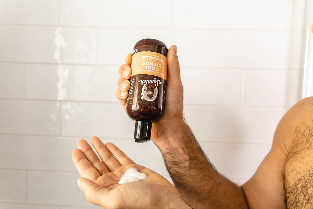 Dr. Squatch fragrance-focused image with citrus scent hint for refreshing grooming.