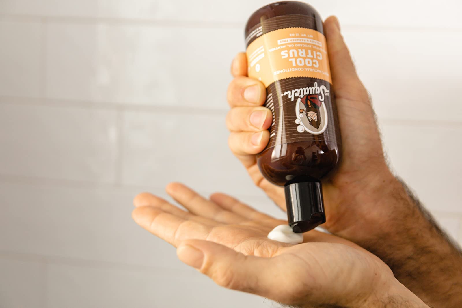 Dr. Squatch Cool Citrus Conditioner label closeup highlighting peppermint for refreshing care.