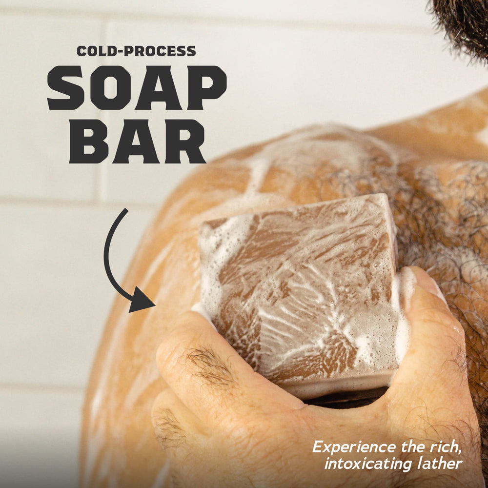 Dr. Squatch Gold Moss bar foam showcasing luxurious texture and refreshing finish.