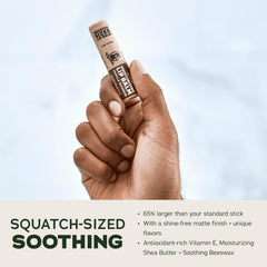 Dr. Squatch Coconut Cove lip balm with tropical scent and deep hydration.