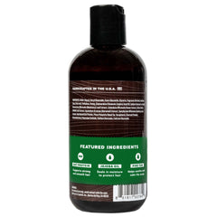 Dr. Squatch Pine Tar Shampoo being poured highlights a bold woodsy aroma.