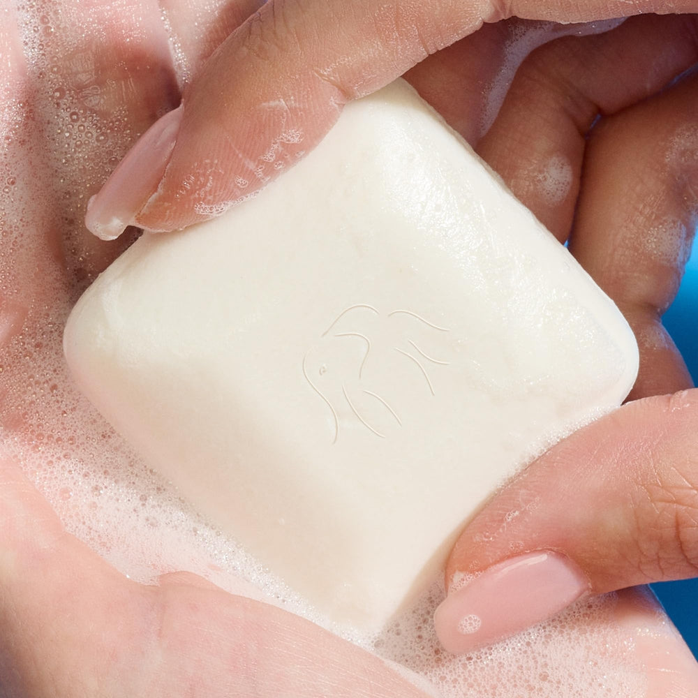 Drunk Elephant Juju Bar close-up highlighting fragrance-free cleansing.