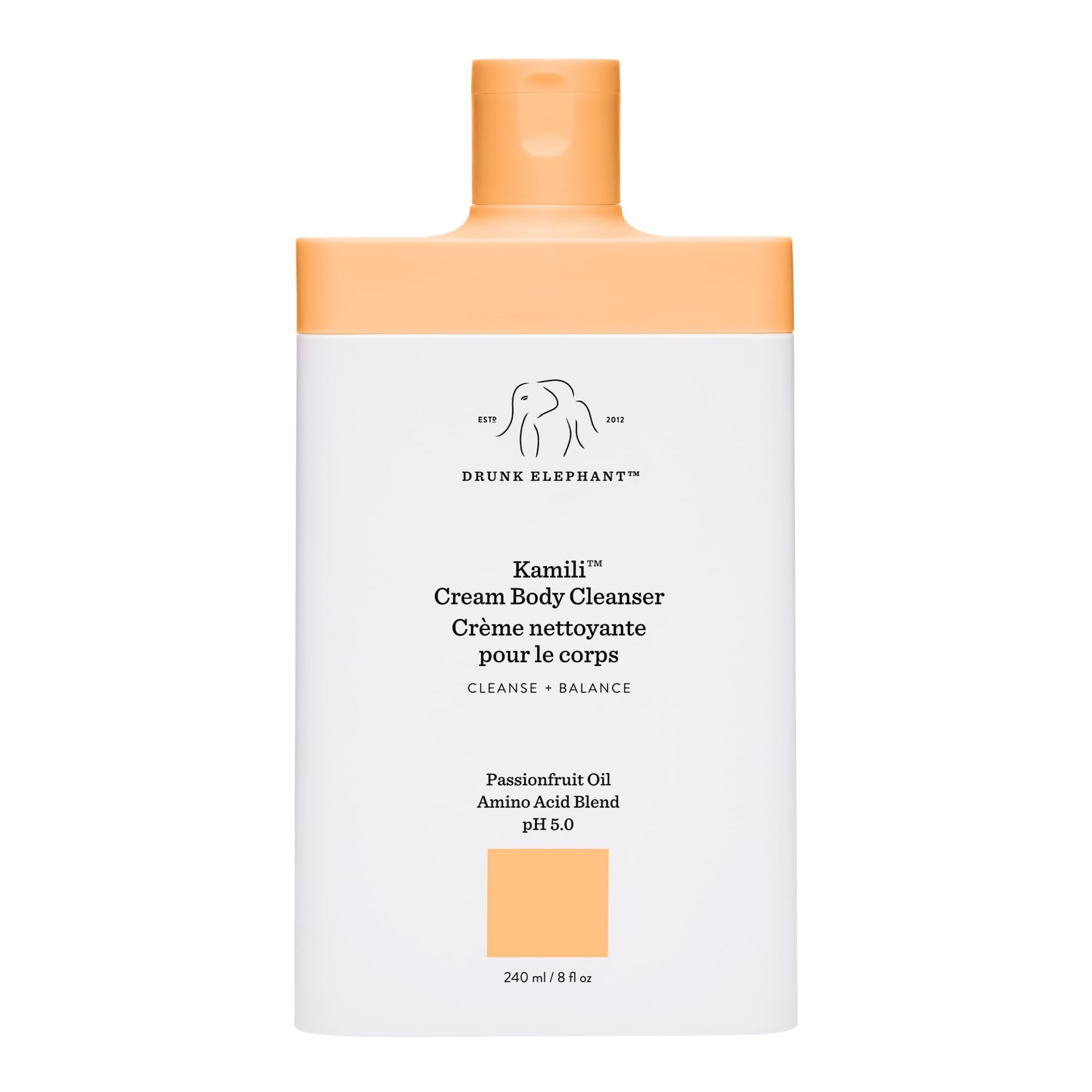 Drunk Elephant Kamili Cream Body Cleanser bottle closeup shows gentle cleansing for sensitive skin.