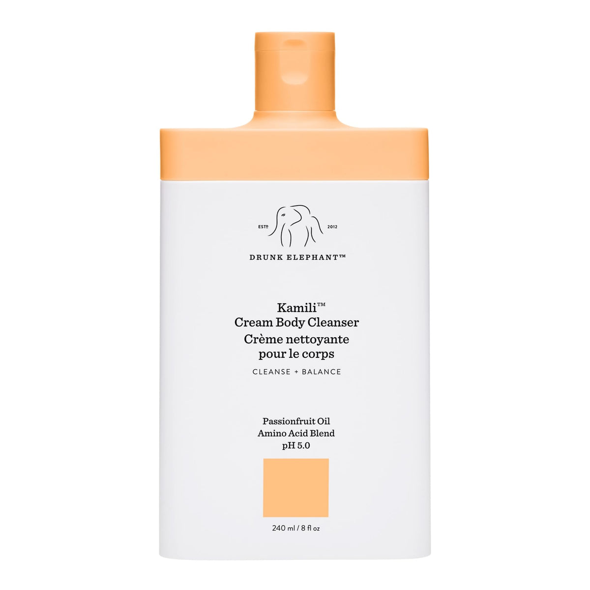 Drunk Elephant Kamili Cream Body Cleanser bottle closeup shows gentle cleansing for sensitive skin.