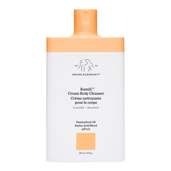 Drunk Elephant Kamili Cream Body Cleanser bottle closeup shows gentle cleansing for sensitive skin.