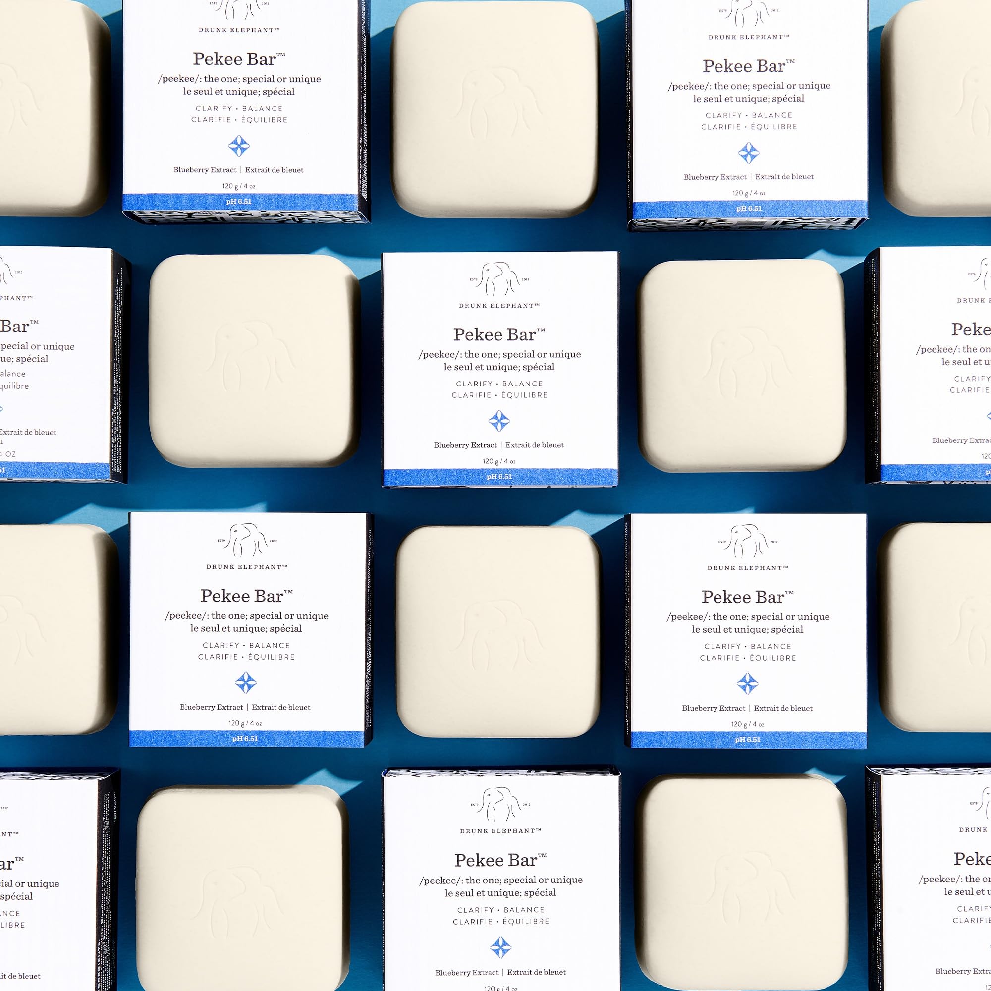 Drunk Elephant Pekee Bar application on face and neck delivers gentle cleansing.