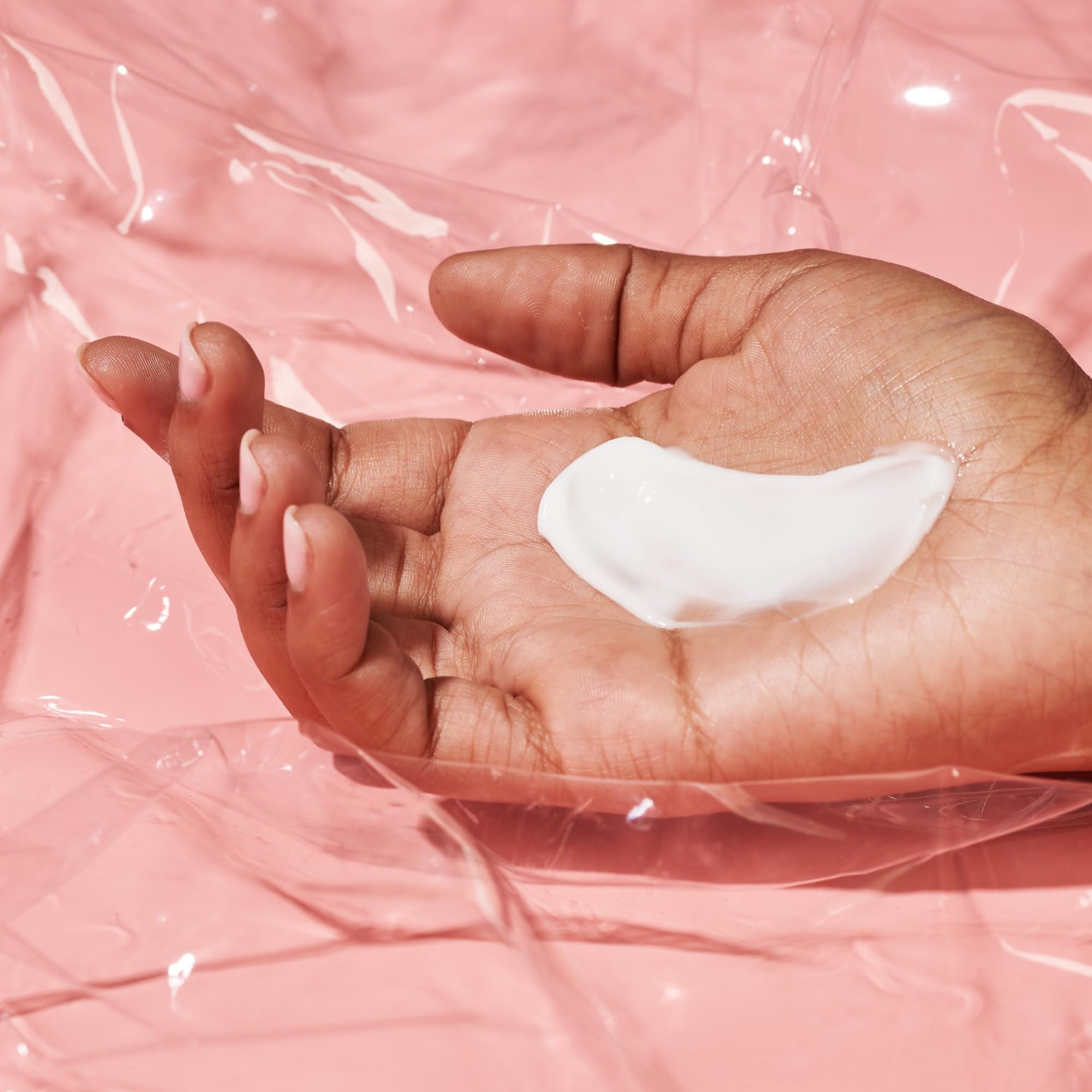 Drunk Elephant Sili Body Lotion close-up showing lightweight cream texture for smooth skin.