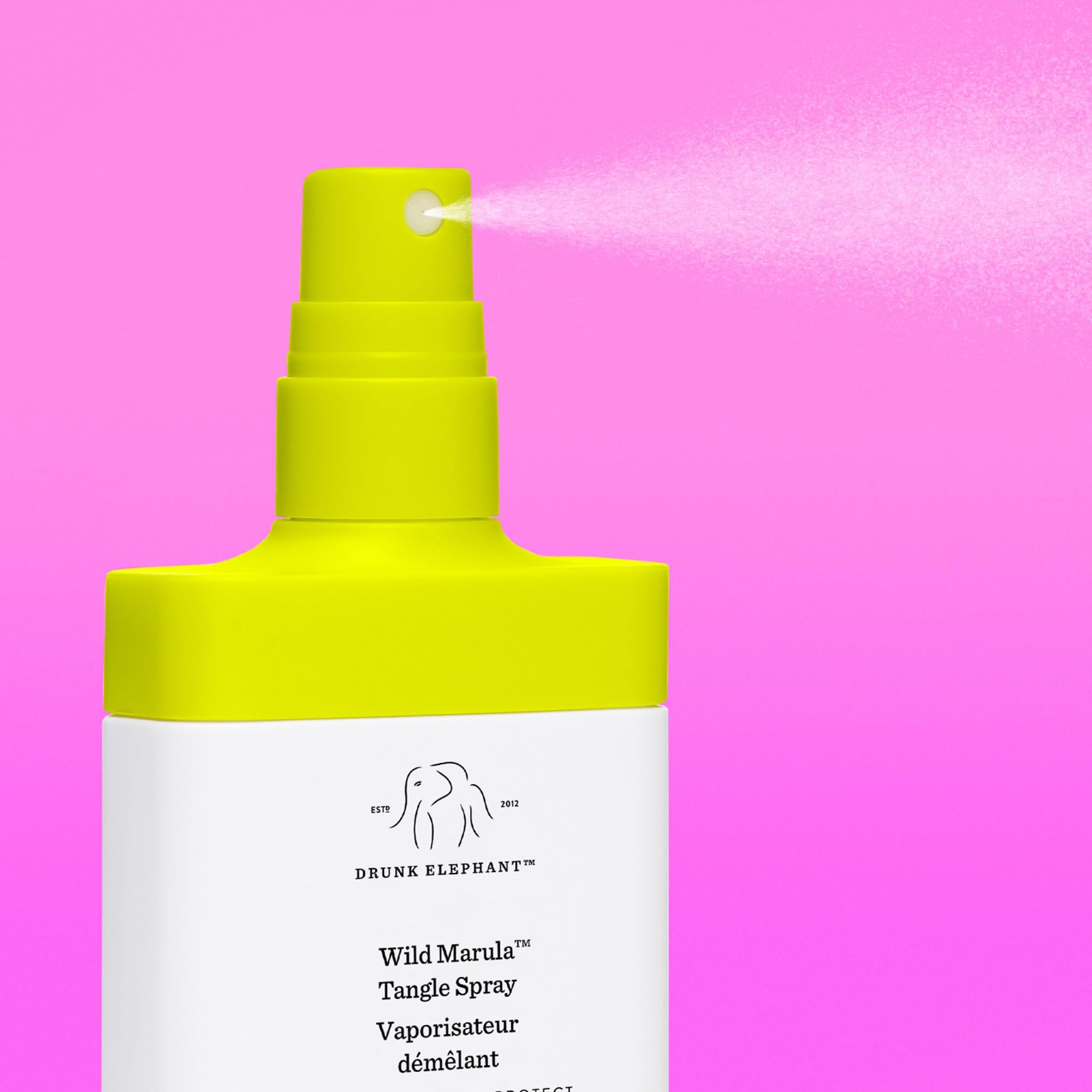 Drunk Elephant Wild Marula Tangle Spray provides heat protection for styled hair.