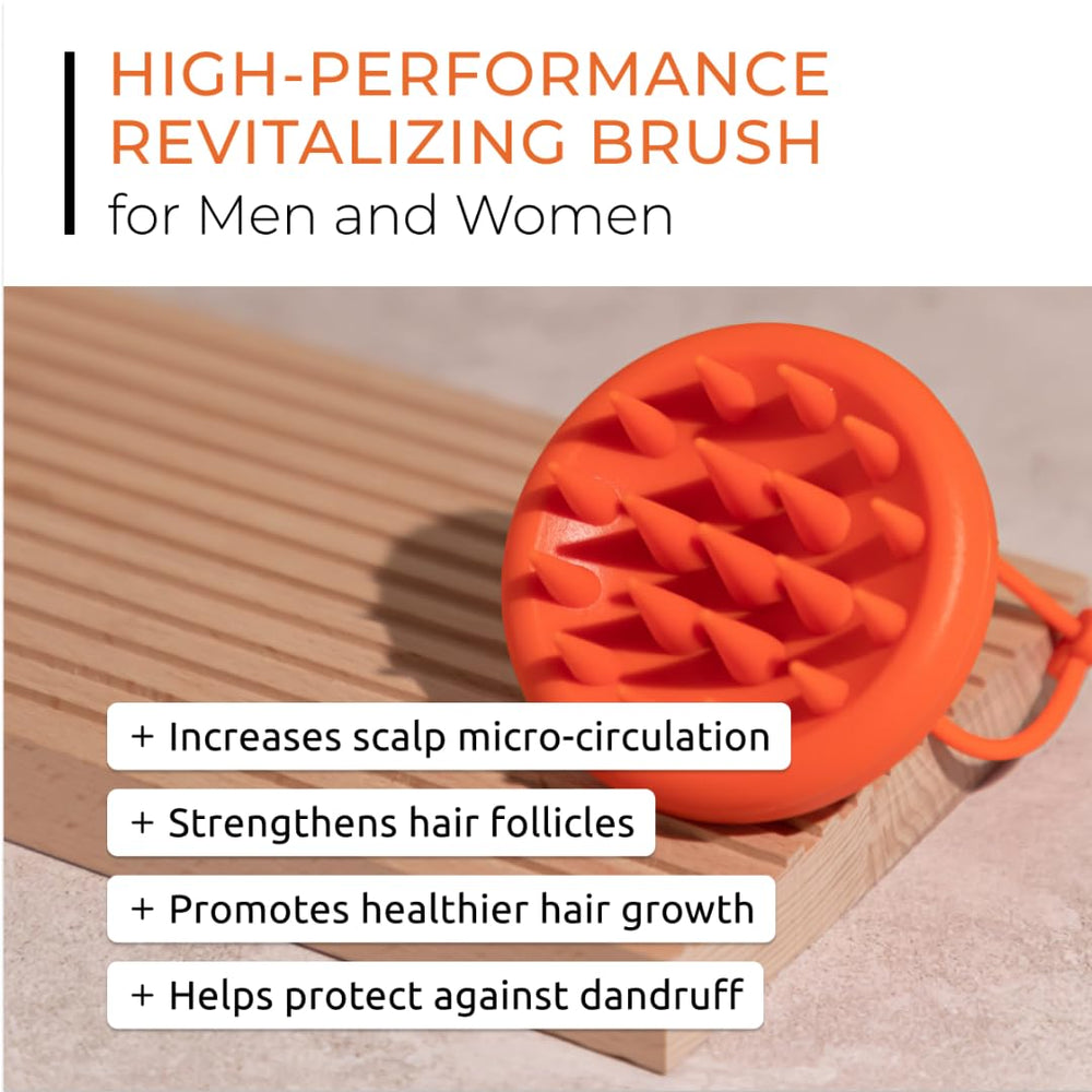 DS Laboratories Revitalizing Scalp Brush in shower shows ergonomic palm grip for easy massage.