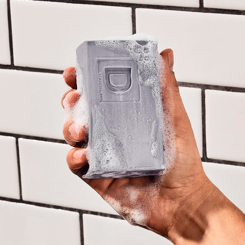 Duke Cannon Big Brick Soap Fresh Cut Pine image evokes invigorating pine aroma for refreshing showers.
