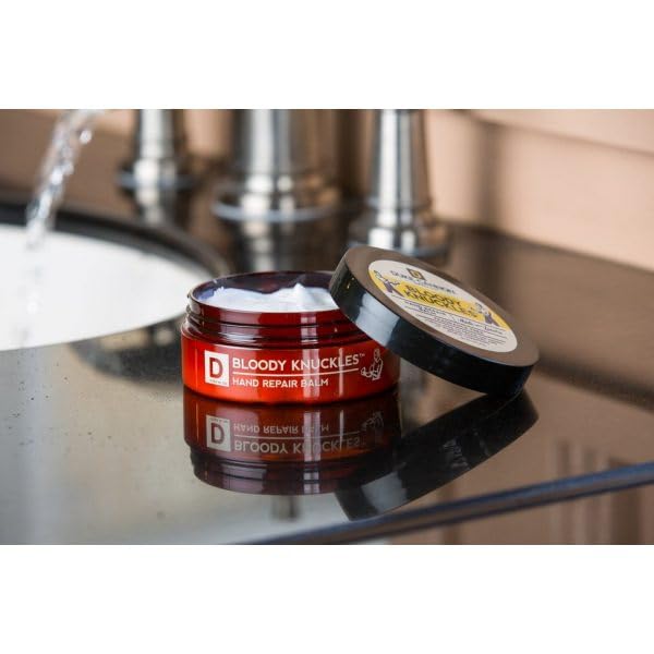 Packaging display of Duke Cannon Bloody Knuckles balm tins