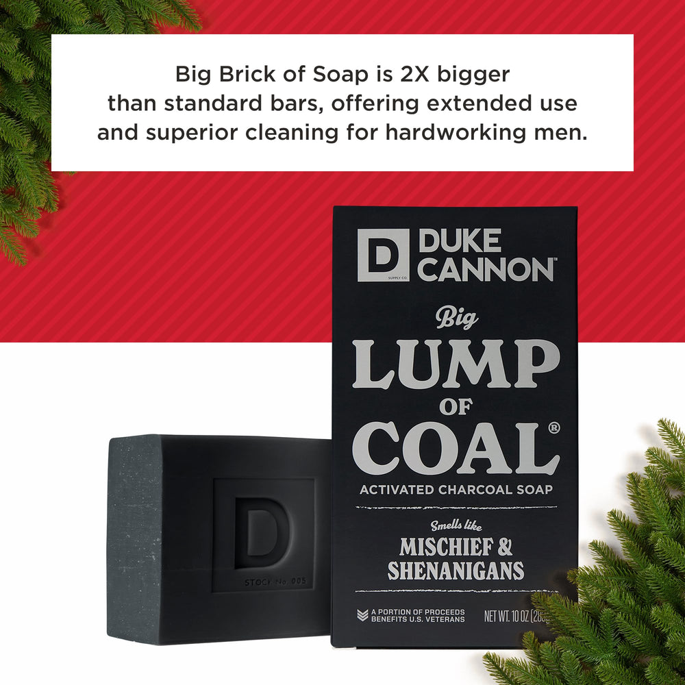 Duke Cannon Lump of Coal soap on display in festive holiday packaging.