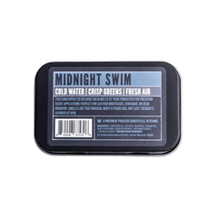 Duke Cannon Midnight Swim application image shows fingertips applying concentrated balm.