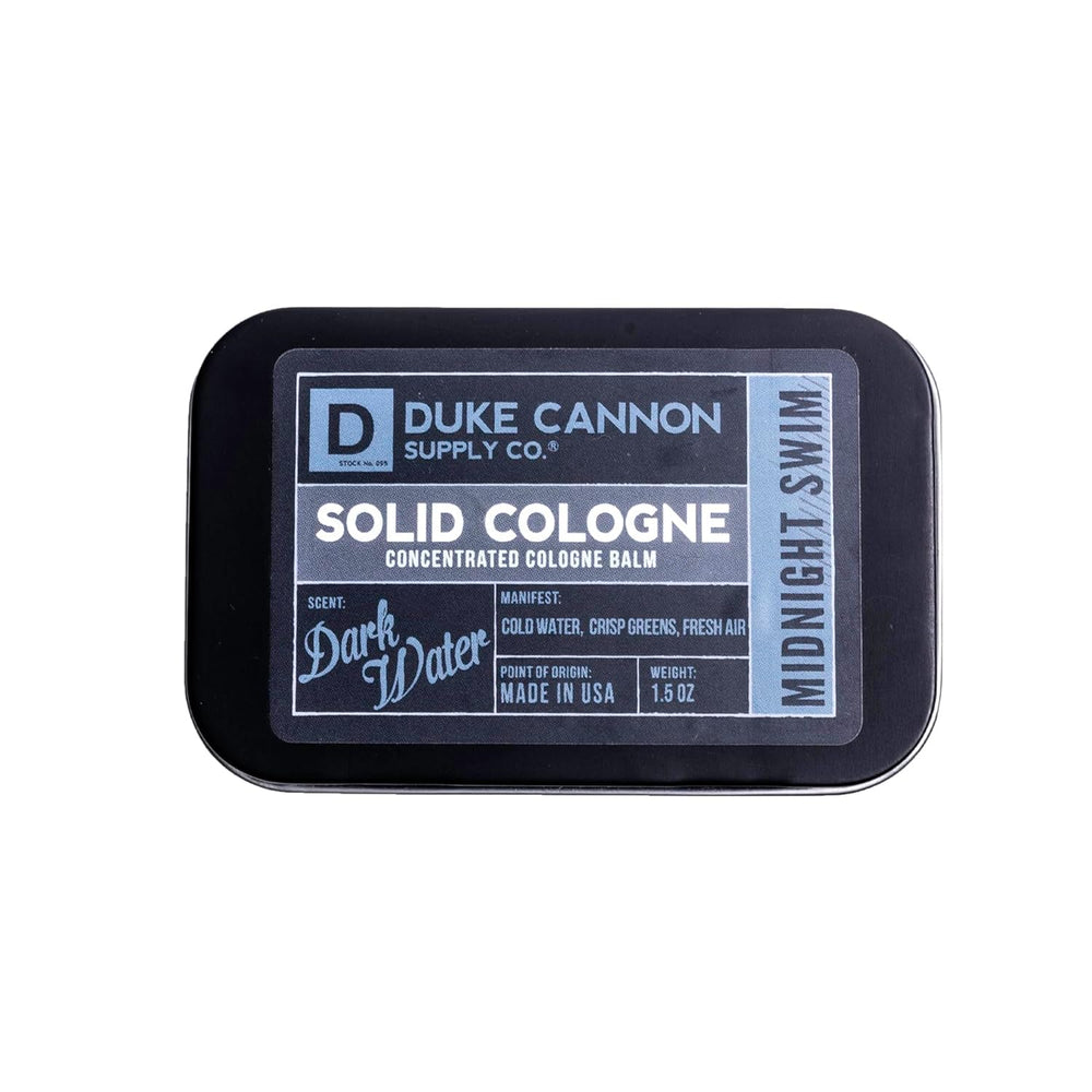 Duke Cannon Midnight Swim solid cologne tin for convenient on-the-go scent touch-ups.