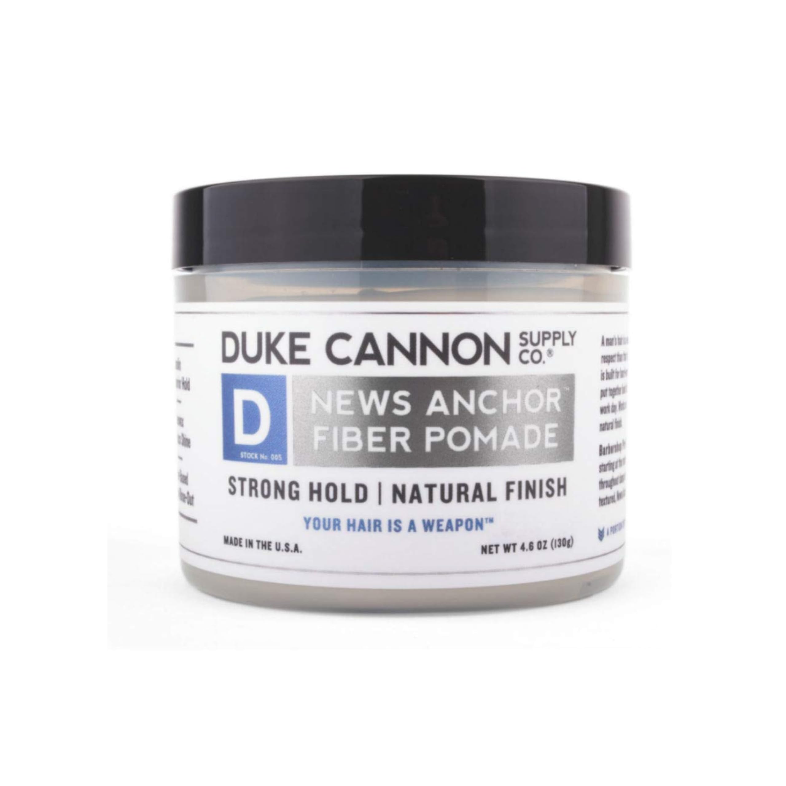 Duke Cannon News Anchor Fiber Pomade tube closeup for strong hold results.