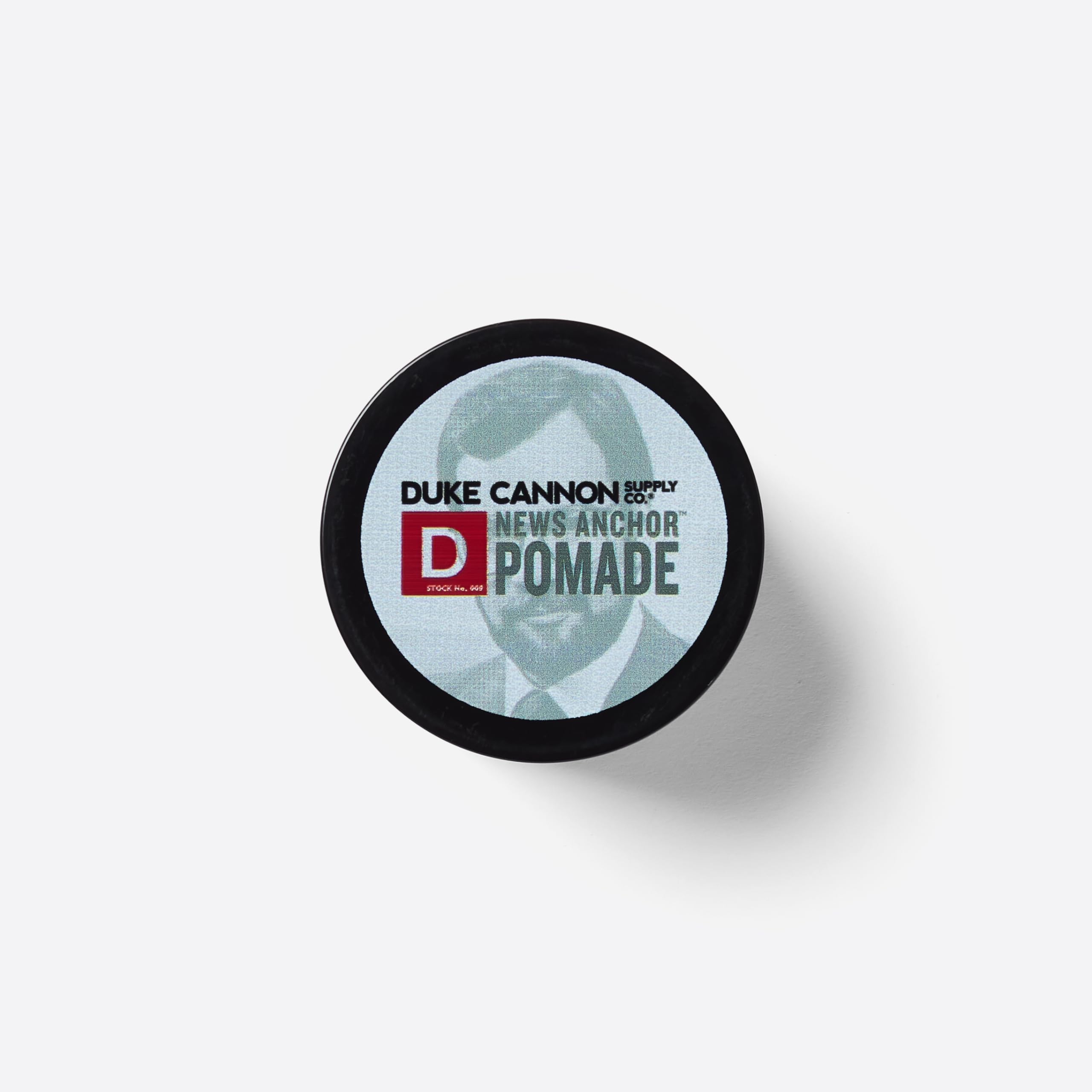 Duke Cannon News Anchor Pomade strong hold style demo shows secure hold without stiffness.