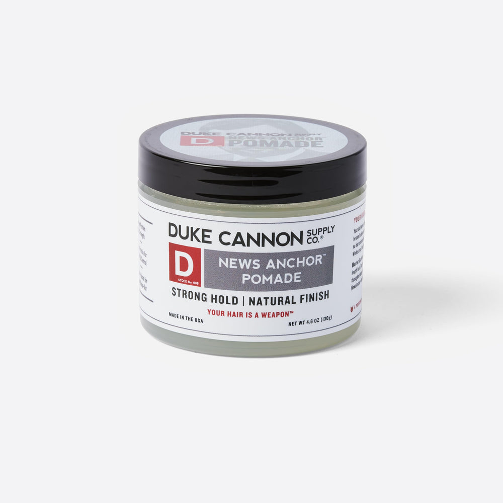 Duke Cannon News Anchor Pomade washout demonstrates easy removal in the shower with water-based formula.