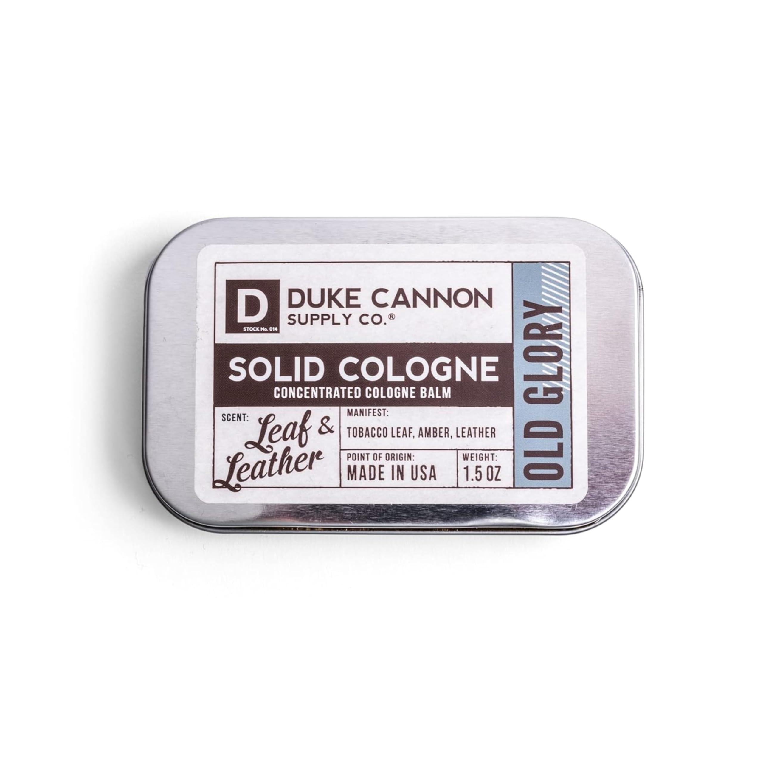 Duke Cannon Old Glory solid cologne tin front view for on-the-go freshness.