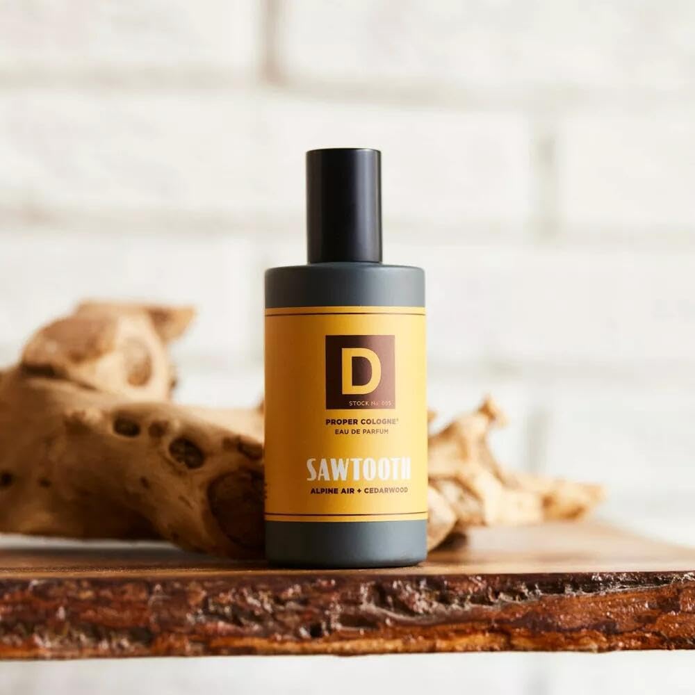 Duke Cannon Proper Cologne Sawtooth cedarwood notes highlight rugged woodsy aroma.