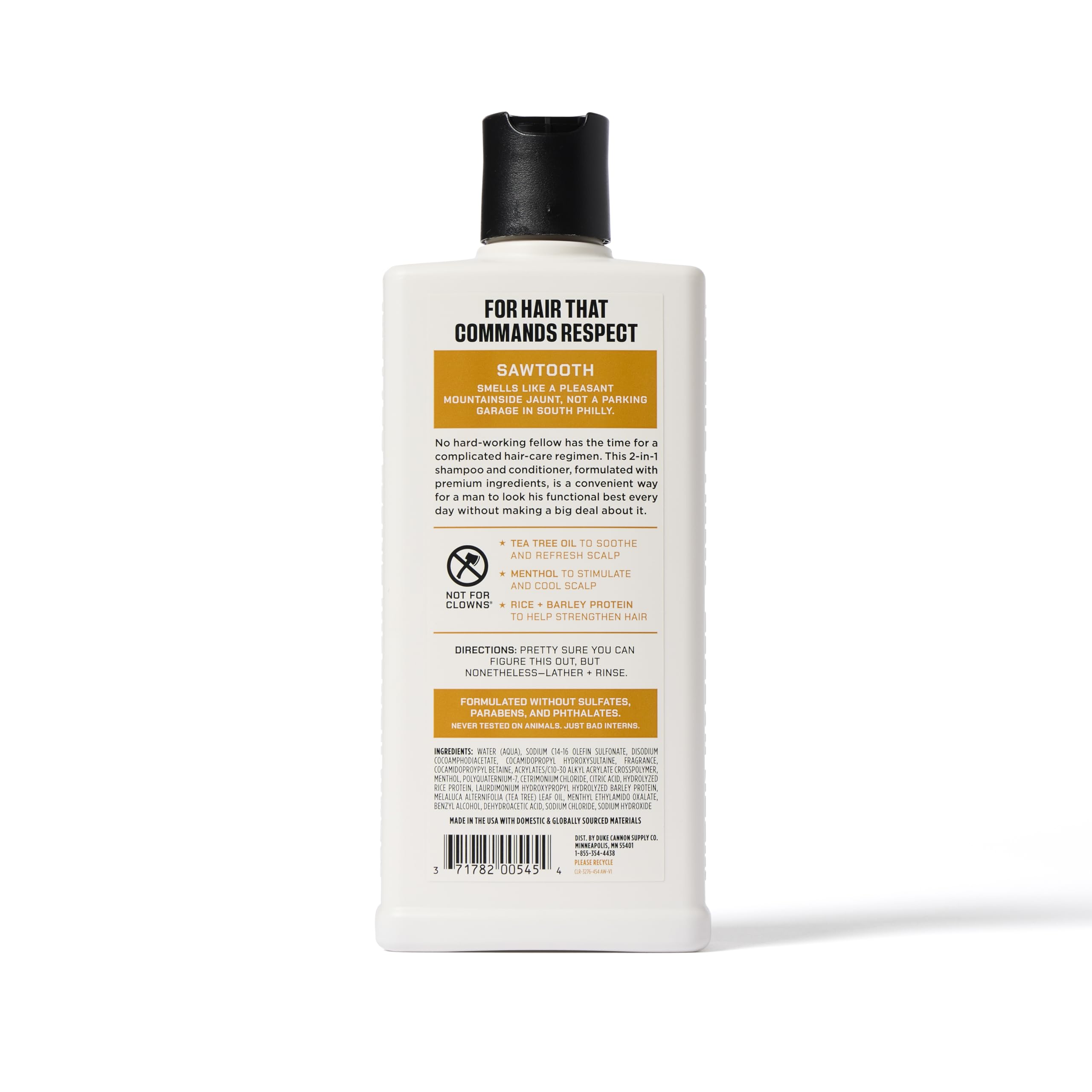 Duke Cannon Sawtooth 2-in-1 Hair Wash bottle close-up highlights refreshing alpine-cedar scent.