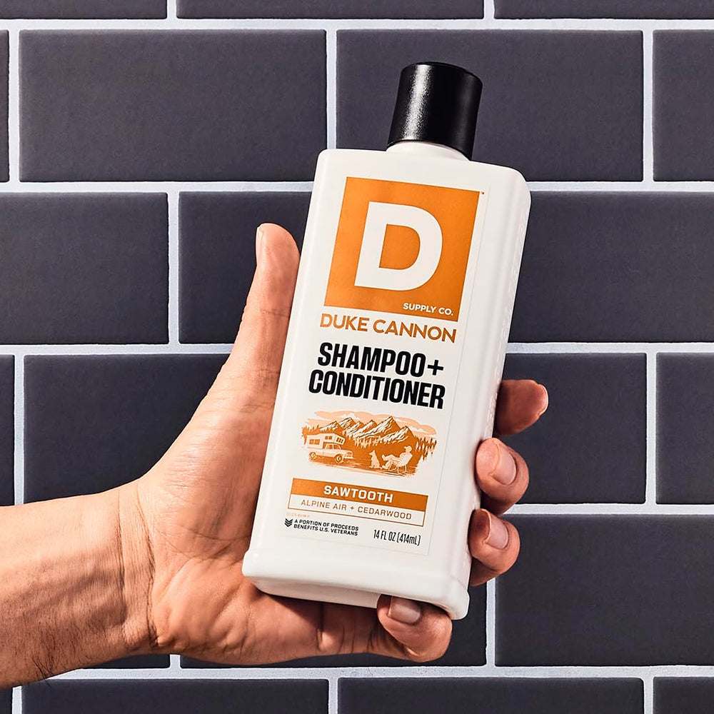 Duke Cannon Sawtooth 2-in-1 Hair Wash lather scene suggests effortless cleansing.