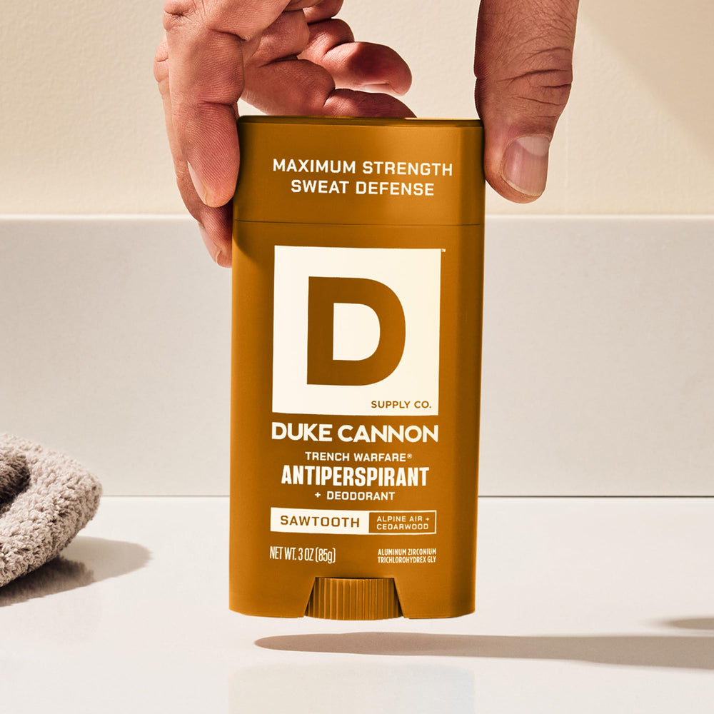 Duke Cannon Sawtooth underarm application demonstrates quick daily protection before workouts