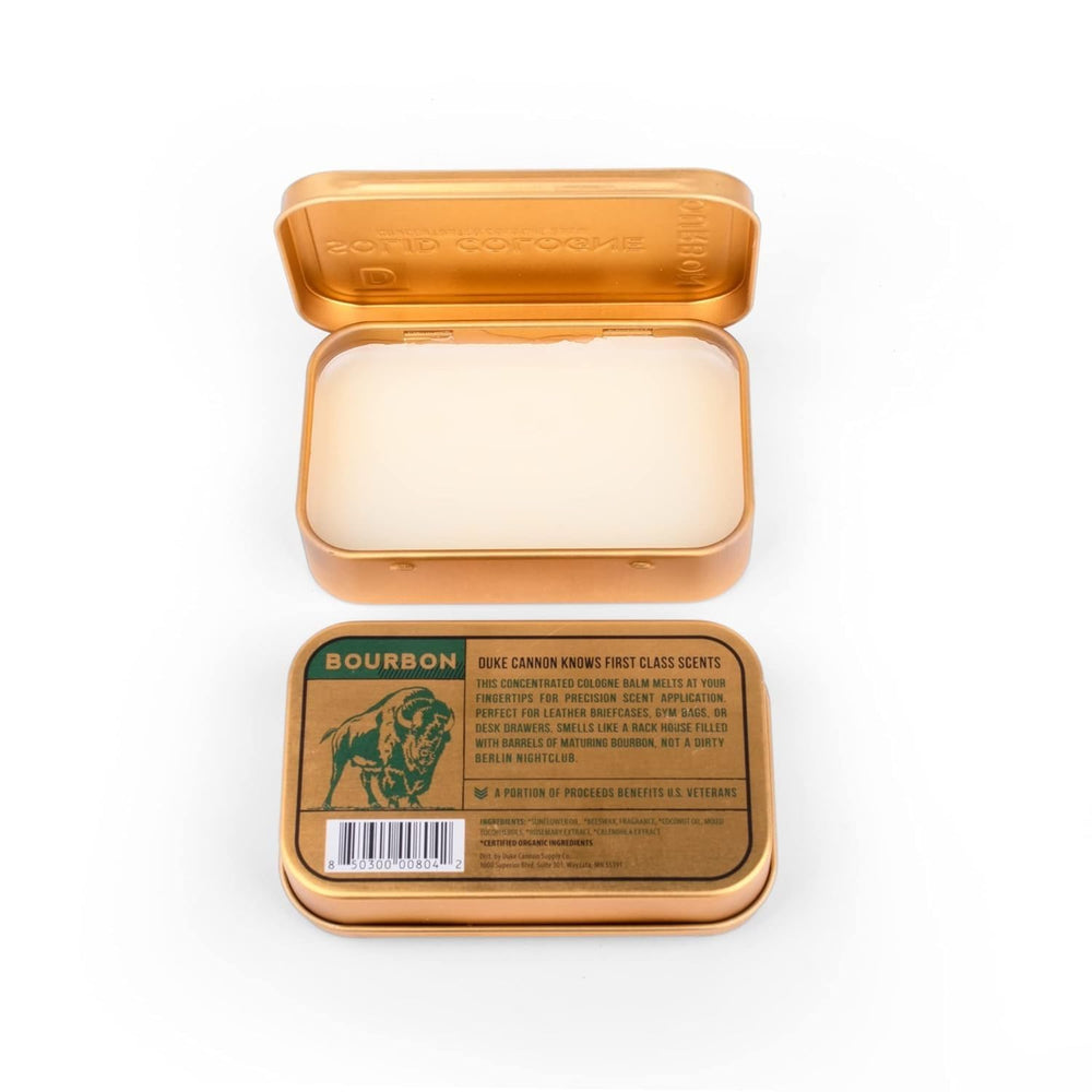 Duke Cannon Bourbon solid cologne packaging detail highlights durable tin.