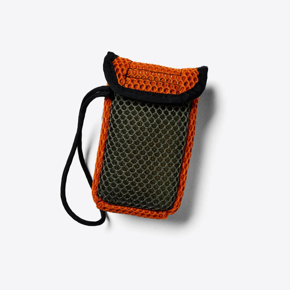 Duke Cannon Tactical Scrubber Pouch shows durable construction for rugged environments and daily showers.