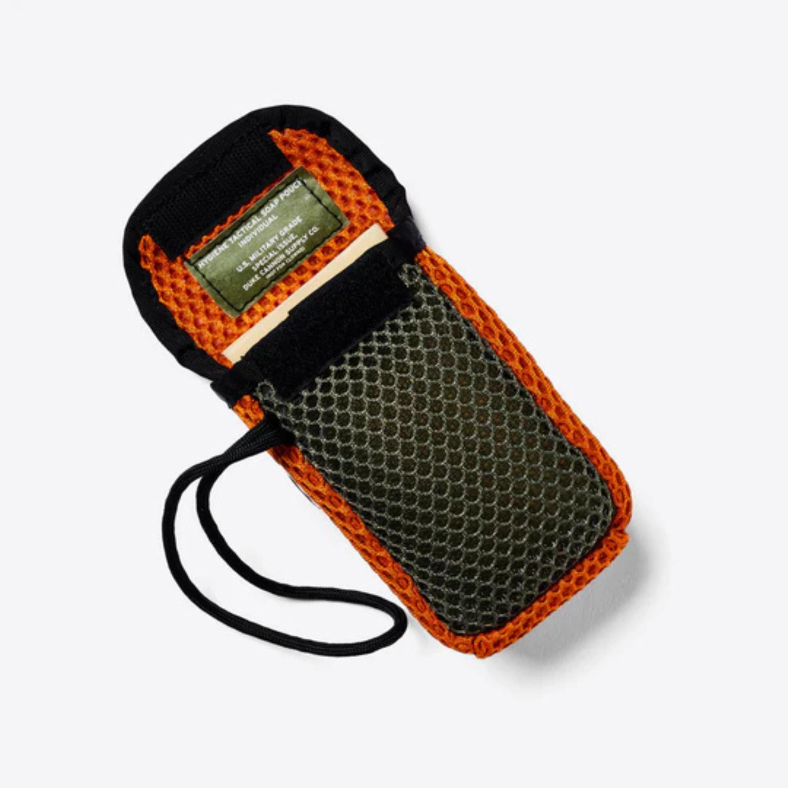 Duke Cannon Tactical Scrubber Pouch demonstrates easy shower setup for home, gym, or field.