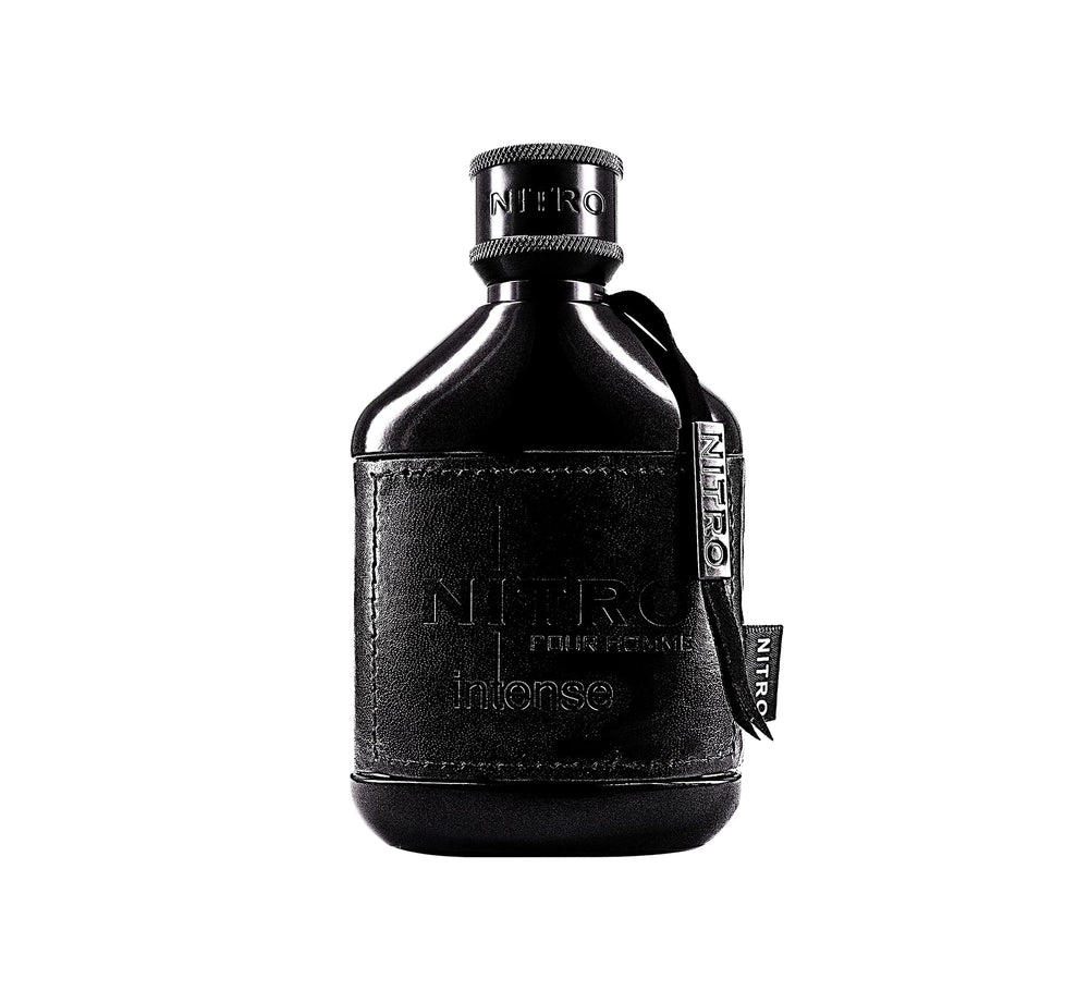 Dumont Nitro Intense close-up of ingredients highlighting warm spices and amber notes for elegant nights.