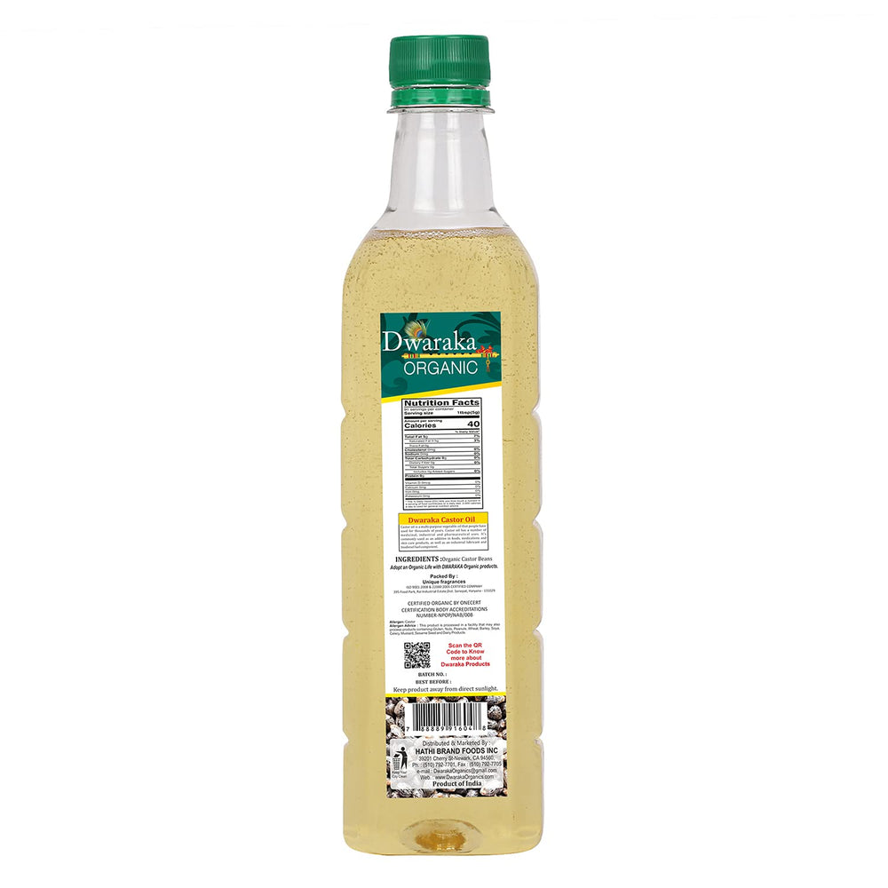 Dwaraka castor oil label close-up emphasizing organic cold-pressed quality.