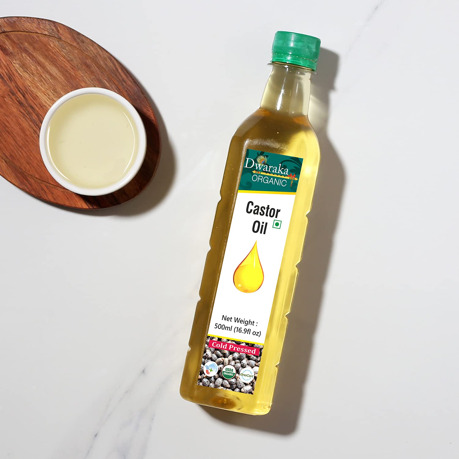 Dwaraka castor oil pour/spout image for easy DIY blends and massage.