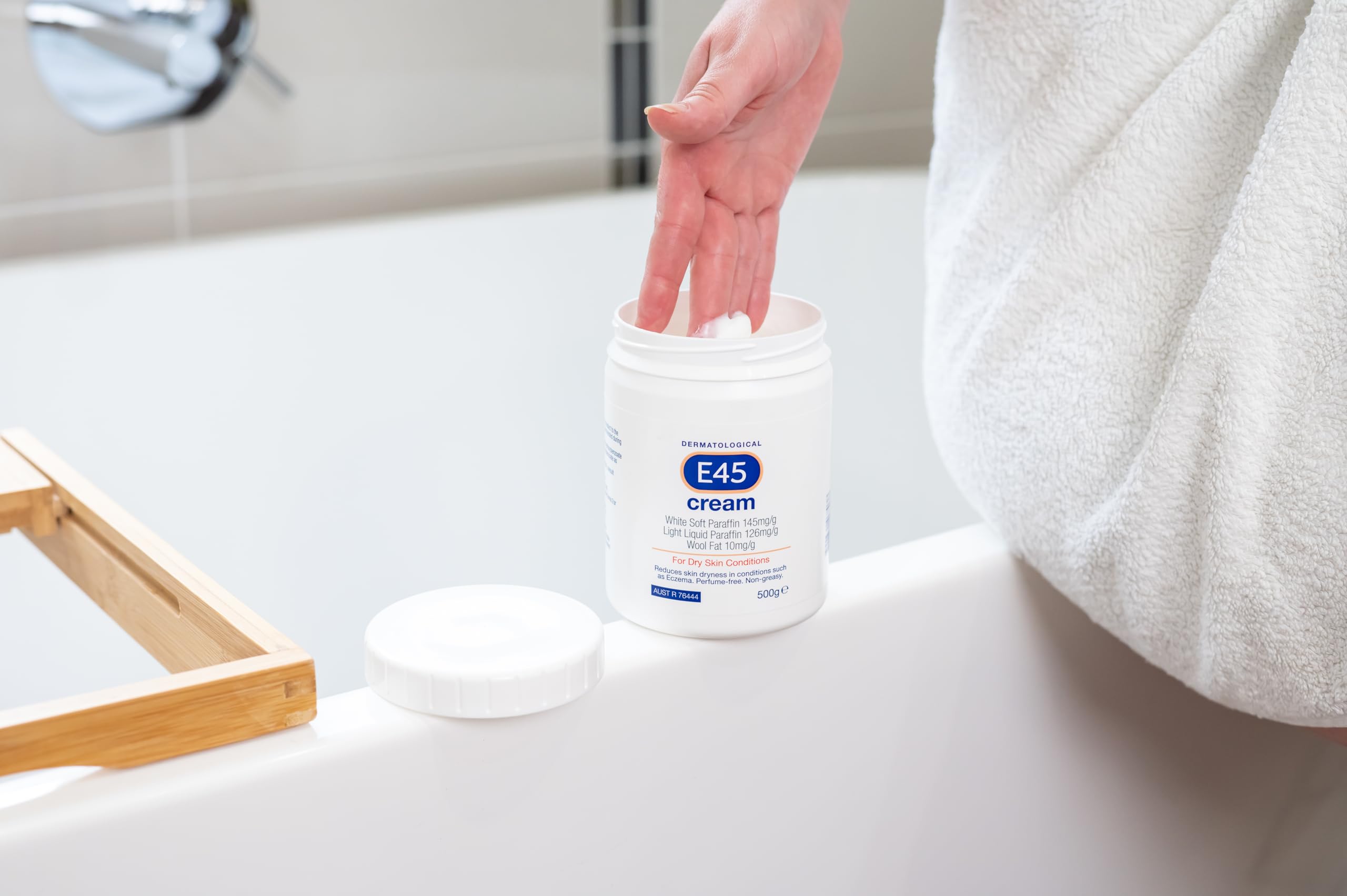 E45 Moisturiser body hydration on arm shows deep moisturization.