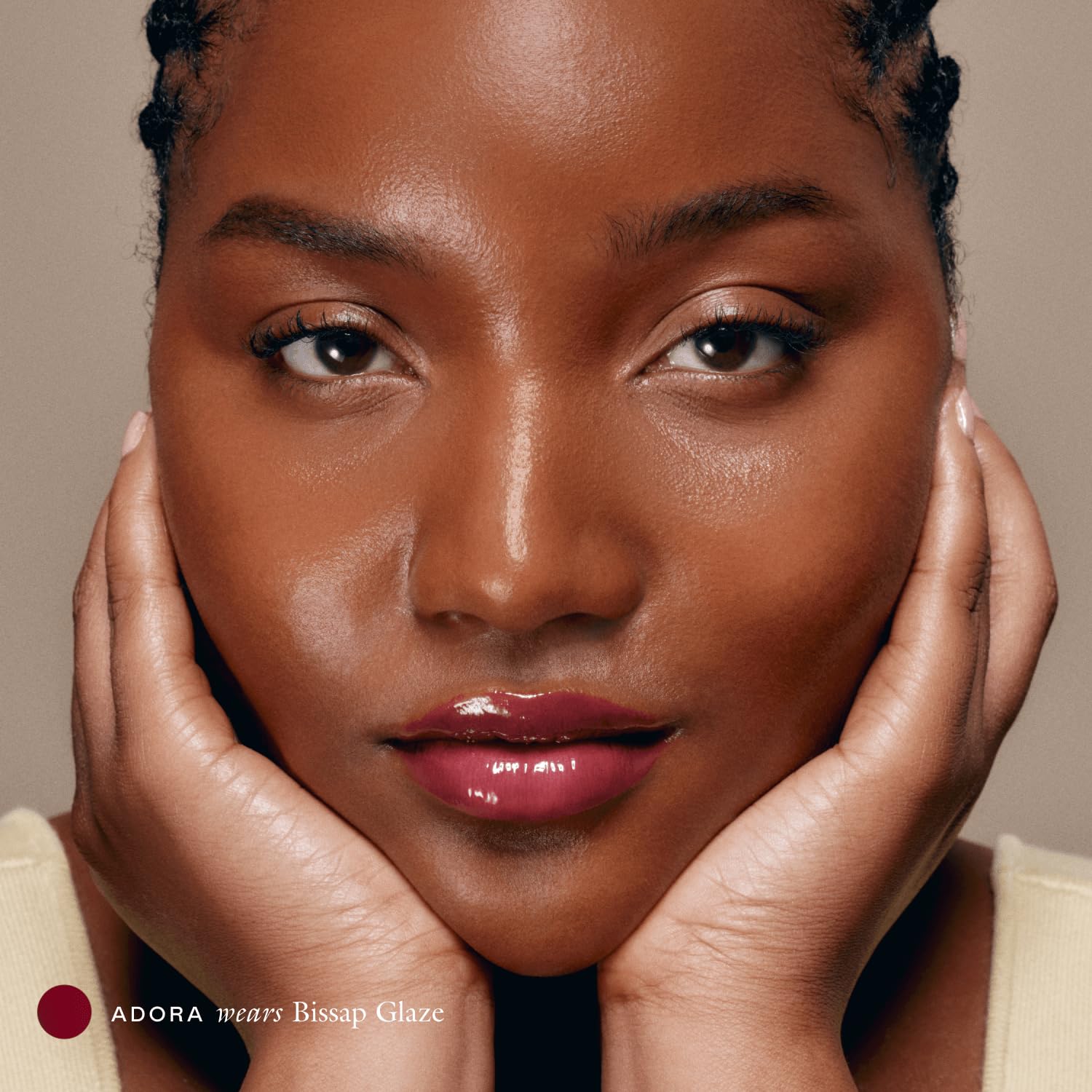 EADEM Le Chouchou gloss swirls showcase earthy plum tint and shine.