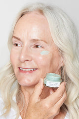 Earth Harbor AQUA AURA eye cream bottle showcasing soothing, brightening eye care
