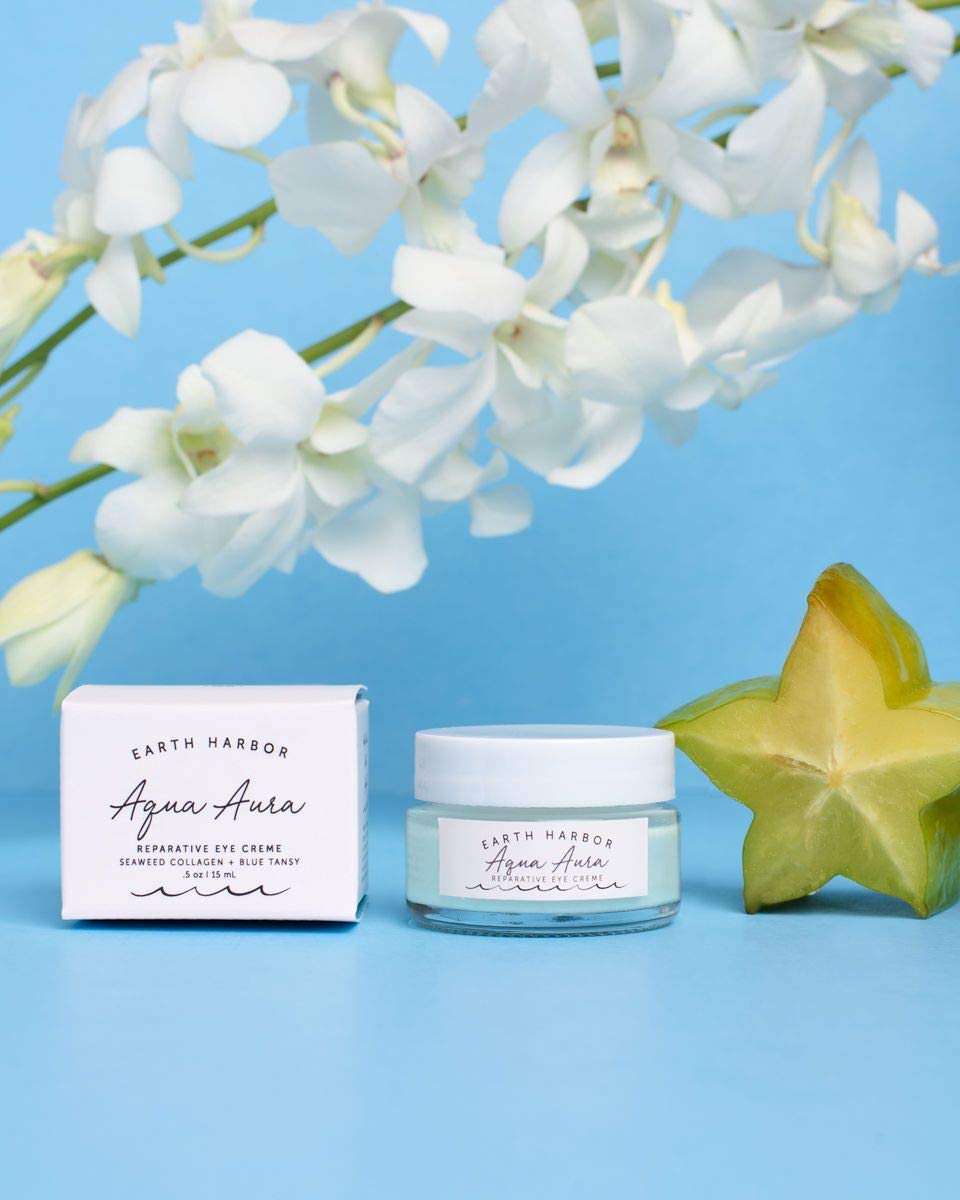 Earth Harbor AQUA AURA eye cream packaging highlights vegan, cruelty-free, and organic standards
