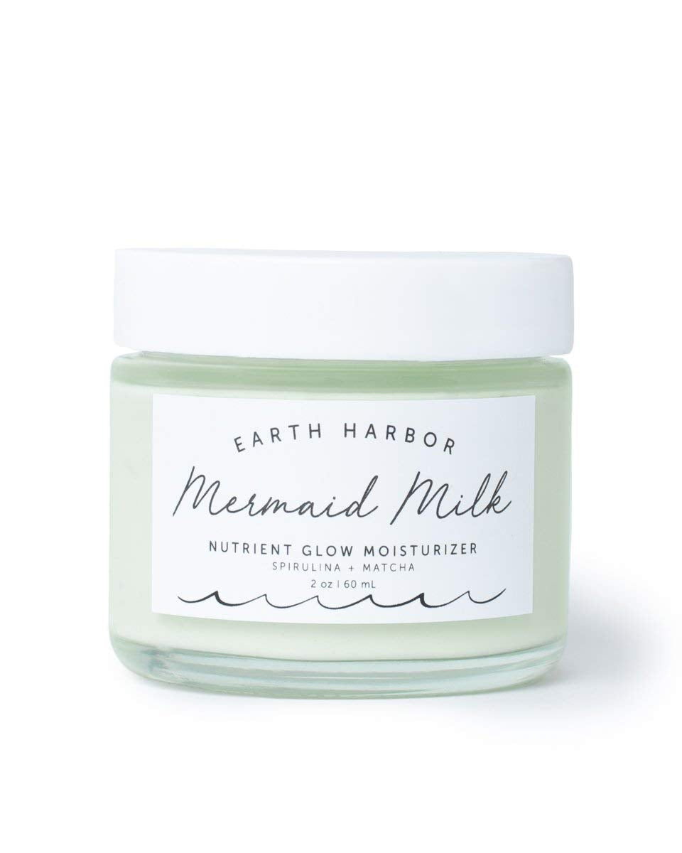 Earth Harbor Mermaid Milk moisturizer bottle emphasizes lightweight hydration for daily use