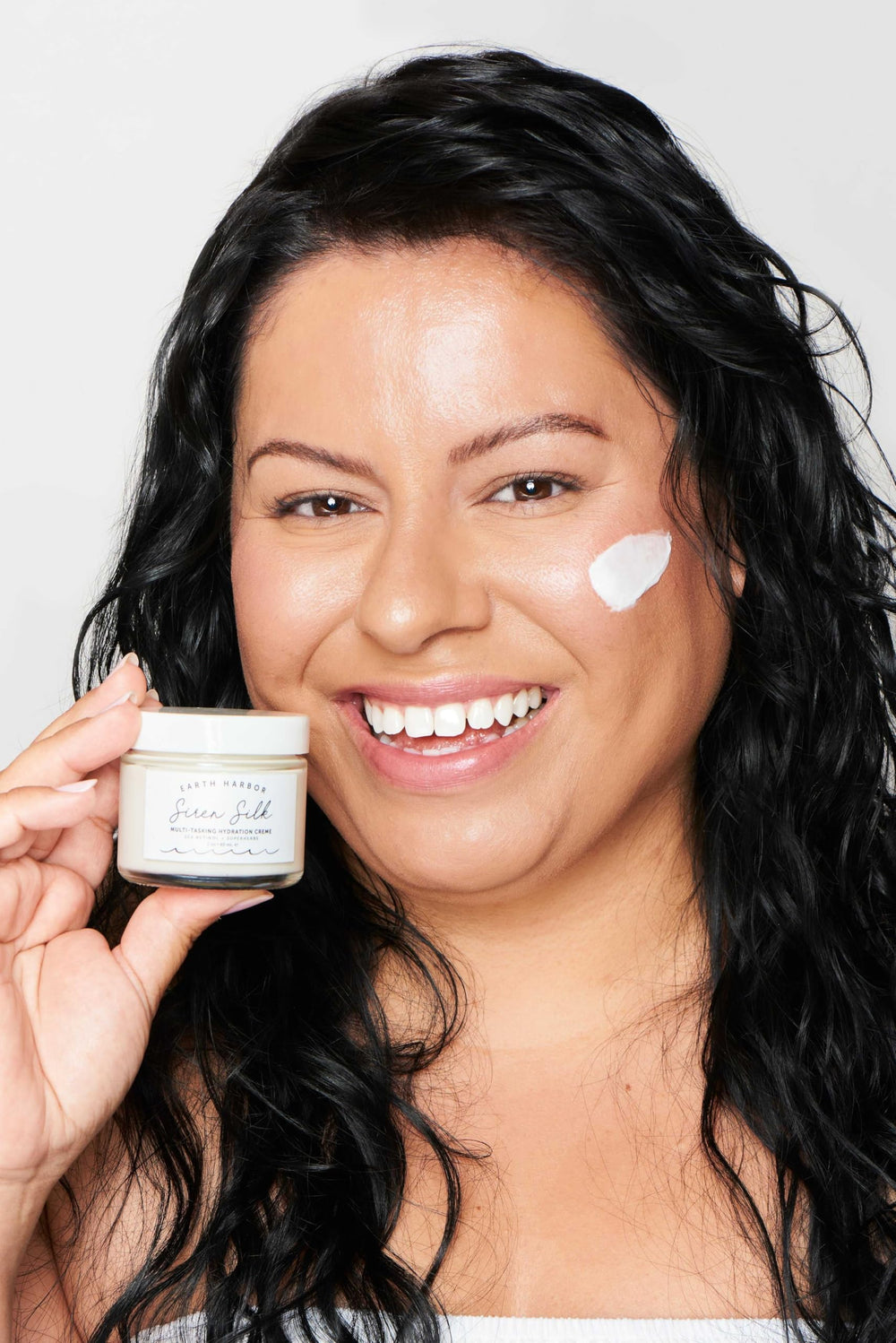 Earth Harbor SIREN SILK being applied to the face for immediate smoothing
