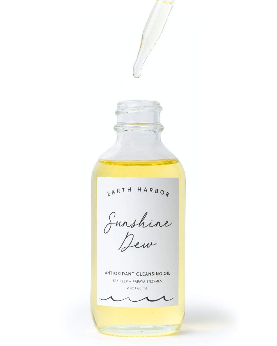 Earth Harbor Sunshine Dew pump-dispense close-up showing quick, non-greasy cleansing.