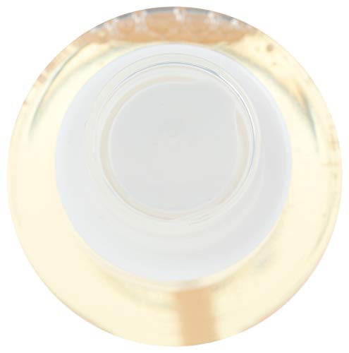 Earth Science Eye Makeup Remover bottle-pour demonstrates easy, quick wipe-away results