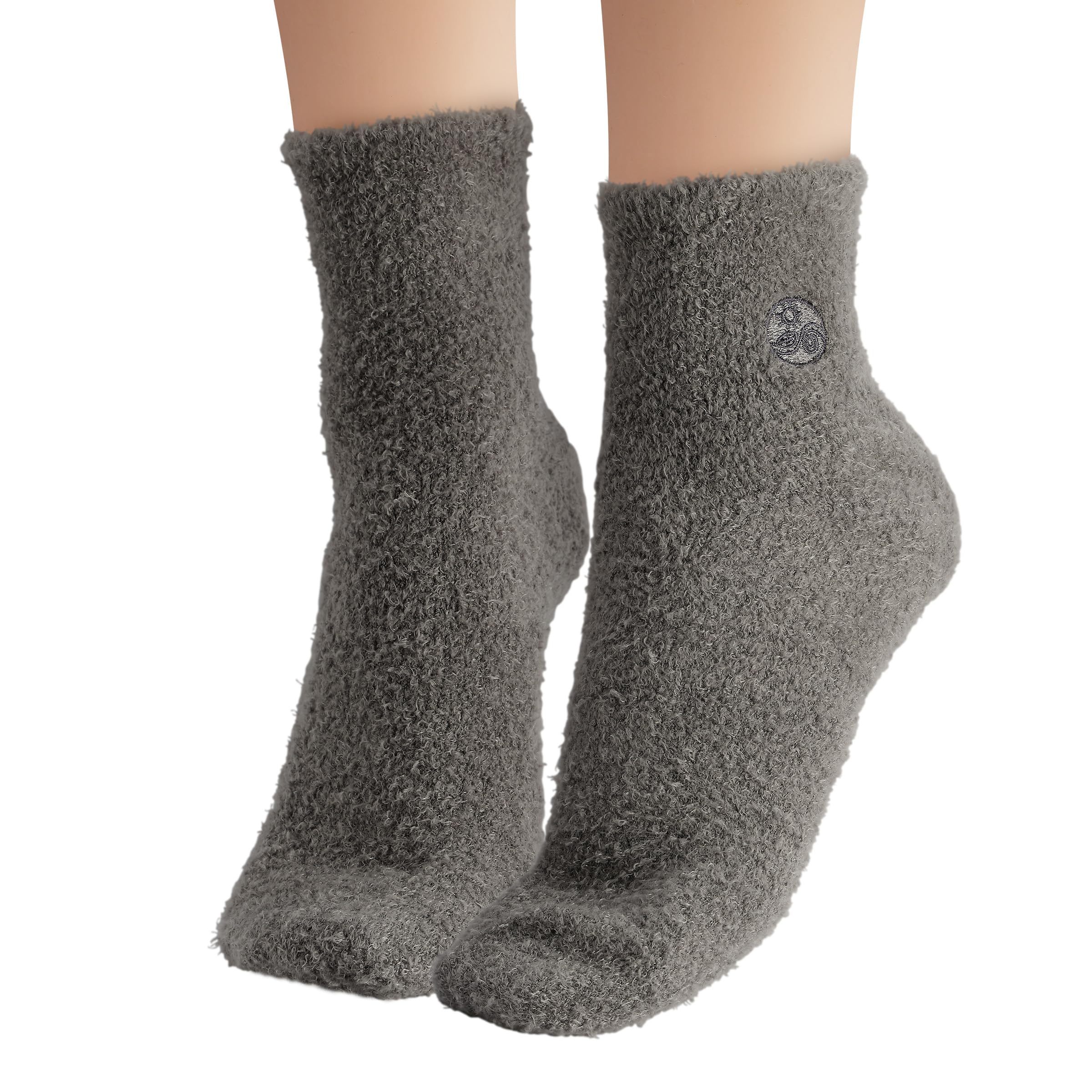 Earth Therapeutics Aloe Socks foot with sock on for cozy wear