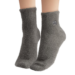 Earth Therapeutics Aloe Socks foot with sock on for cozy wear