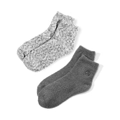 Earth Therapeutics Aloe Socks on foot show plush texture for daily moisture.