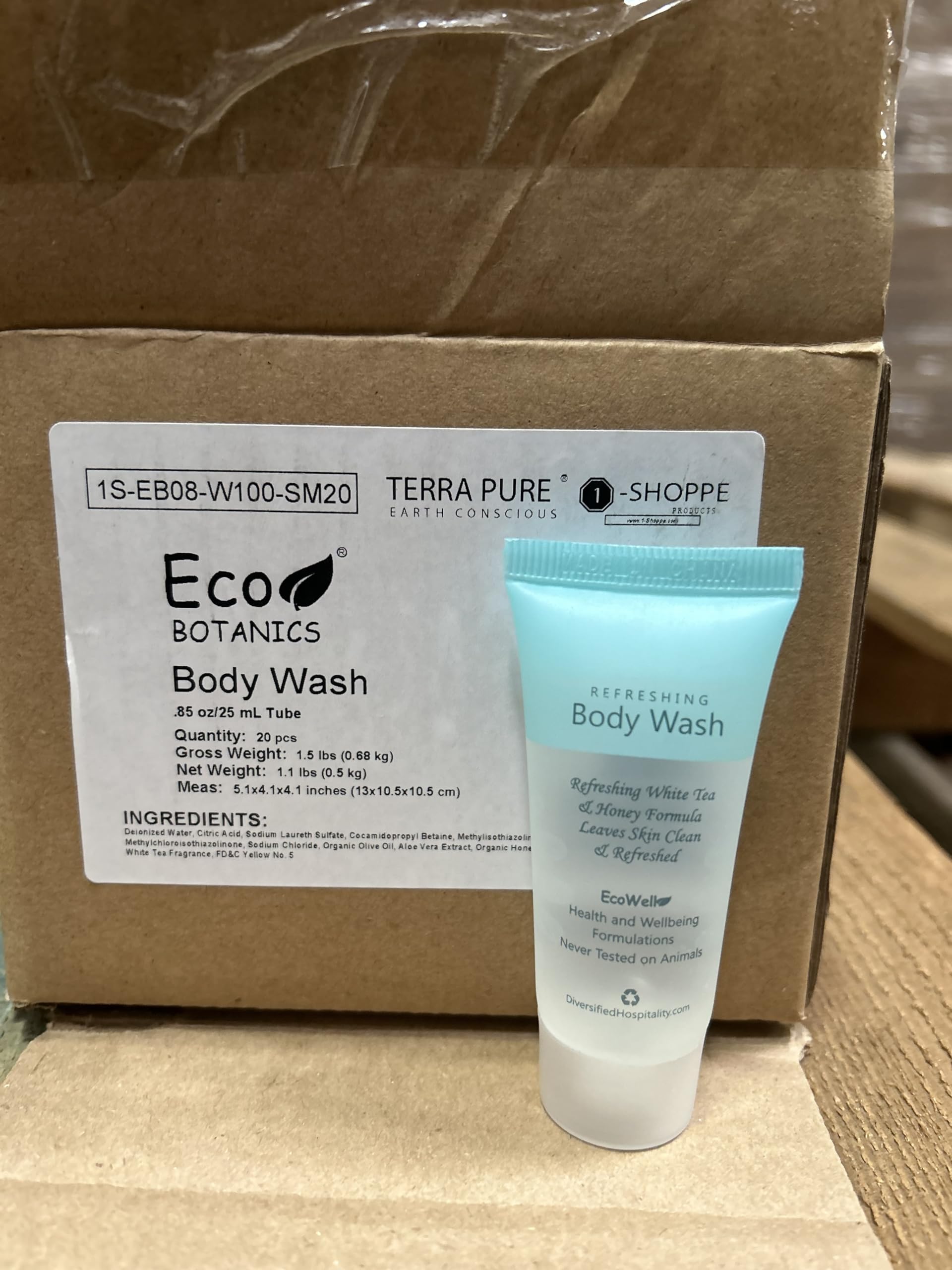 Eco Botanics veteran-owned brand badge on travel toiletries.