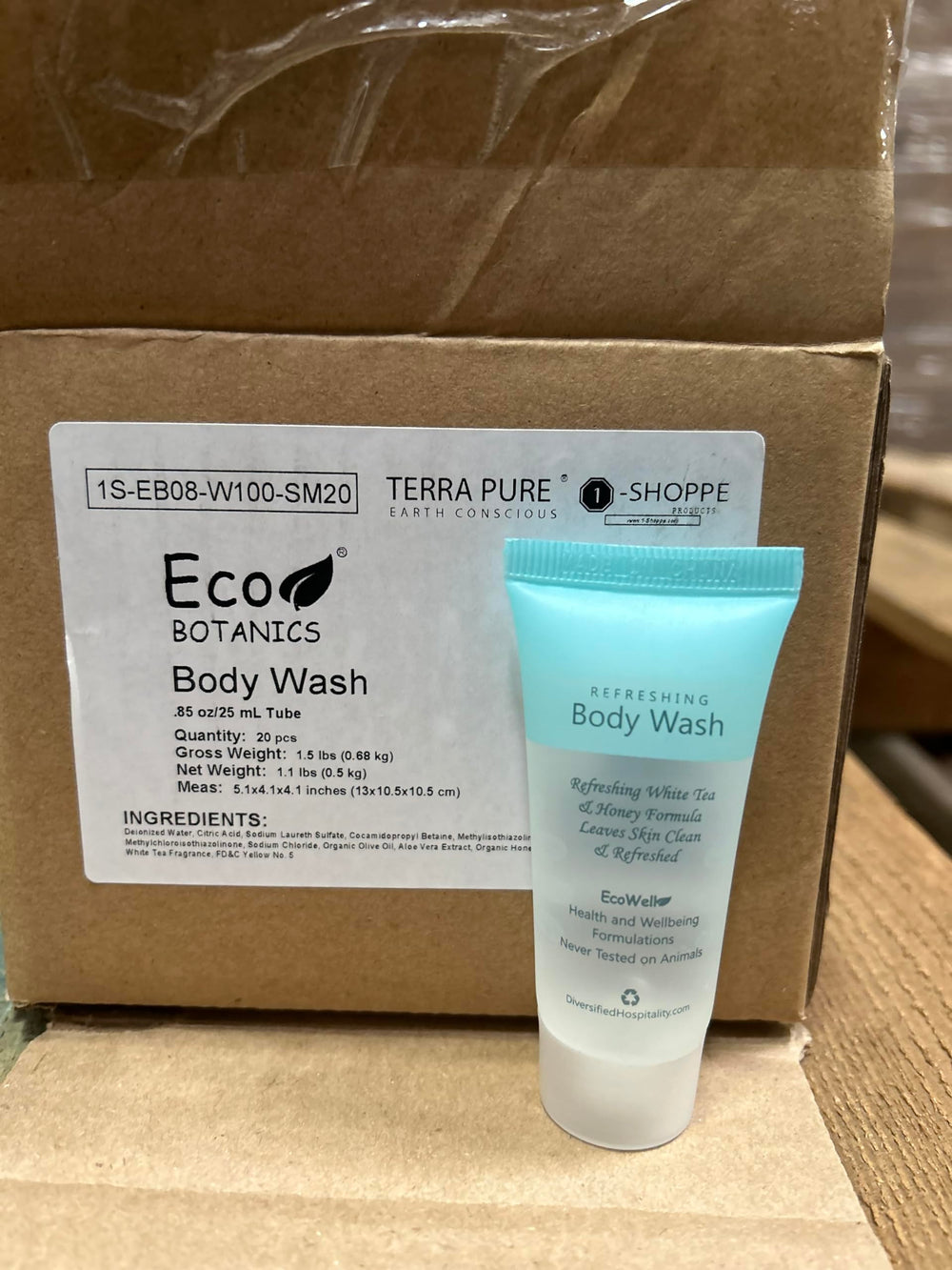 Eco Botanics veteran-owned brand badge on travel toiletries.
