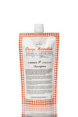 Ecoslay Orange Marmalade bottle close-up for long-lasting curl hold.