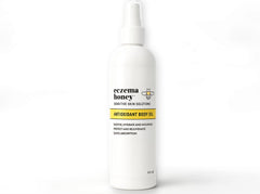 ECZEMA HONEY antioxidant body oil bottle for daily eczema-prone skin hydration.